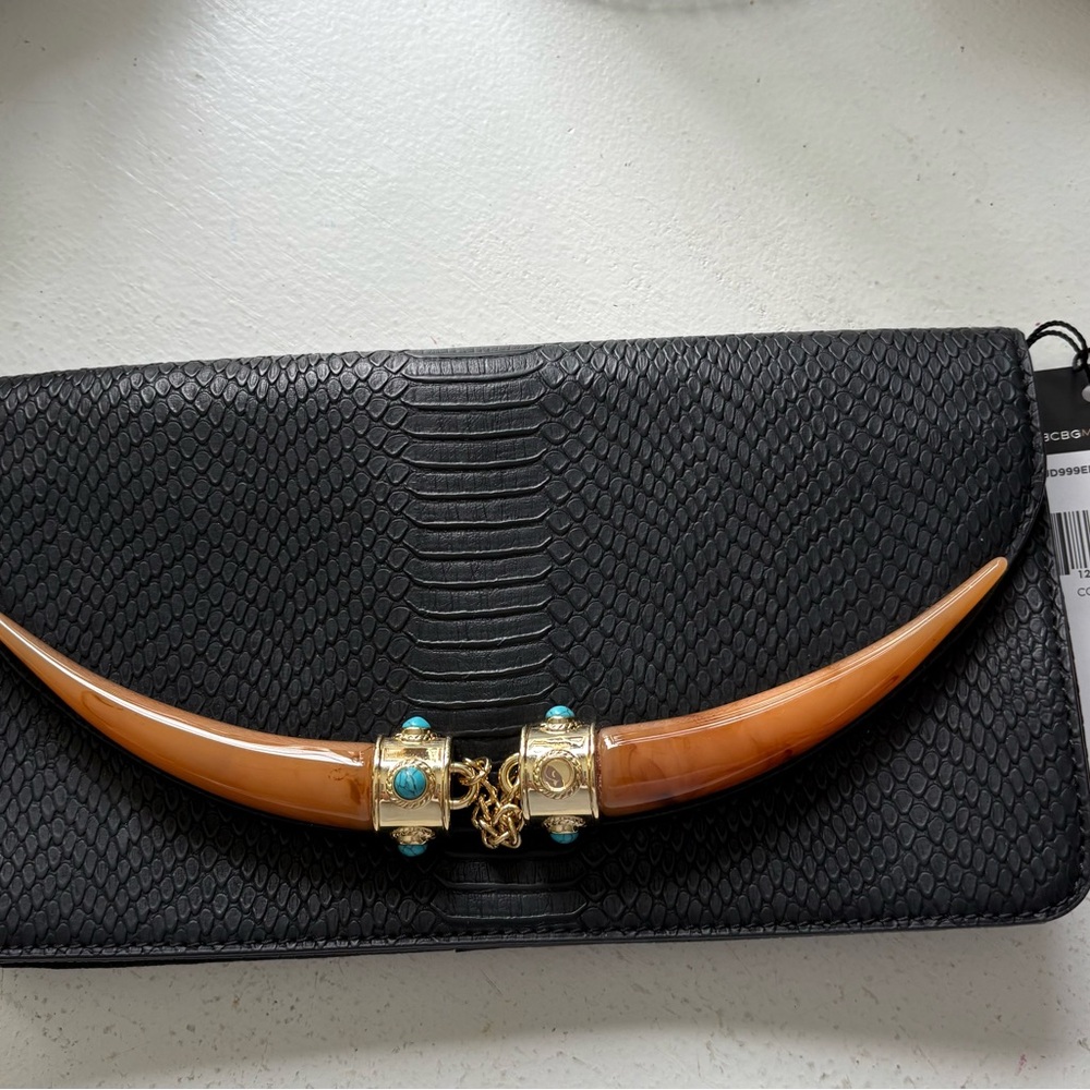 BCBGMAXAZRIA Black Clutch with Gold Accents. One stone missing on the front - Picture 2 of 7